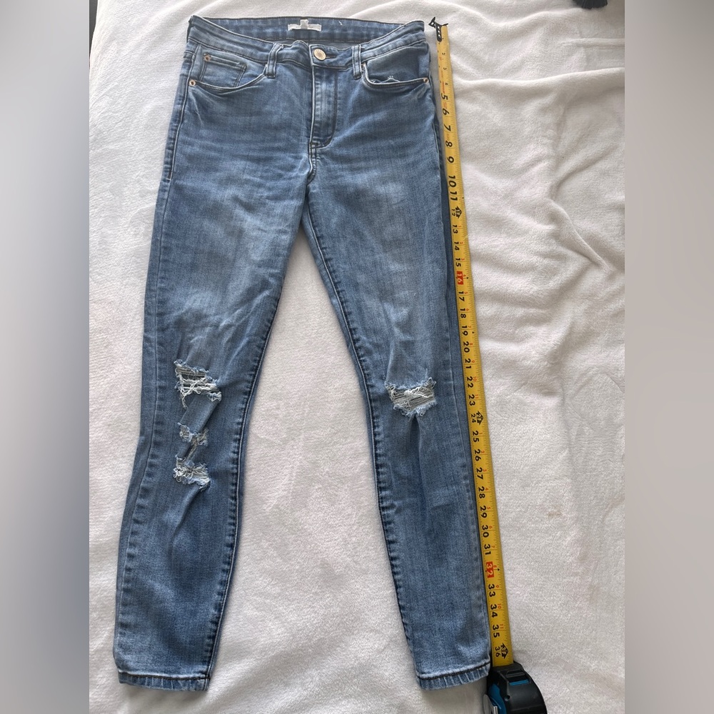Ripped blue jeans
